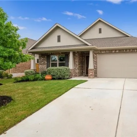 Rent this 3 bed house on 4052 Flowstone Ln in Round Rock, Texas
