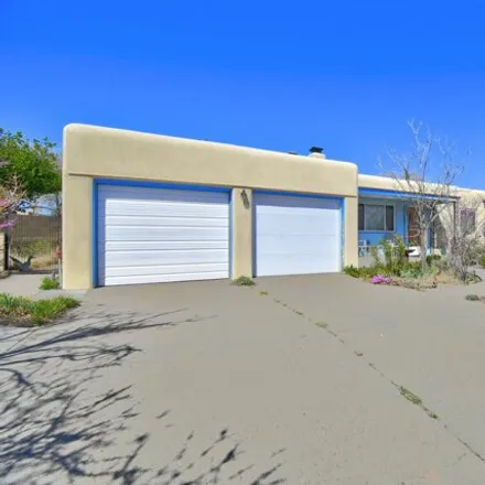 Buy this 3 bed house on 1411 Quincy Street Northeast in Albuquerque, NM 87110