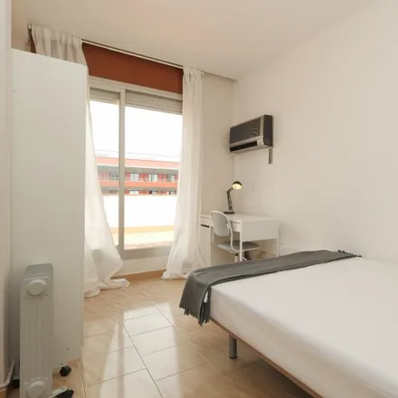 Rent this 6 bed room on Carrer de Caballero in 2, 4