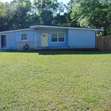 Rent this 4 bed house on 2274 Monteau Drive in Normandy Village, Jacksonville