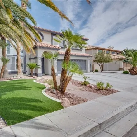Buy this 4 bed house on 1040 Aspen Breeze Avenue in Paradise, NV 89123