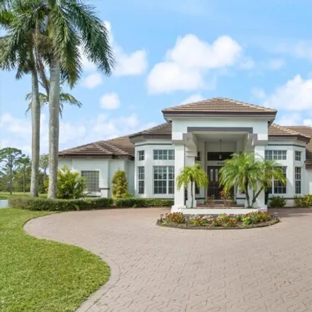 Buy this 6 bed house on 8151 Woodsmuir Drive in Palm Beach County, FL 33412