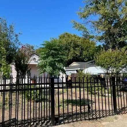 Buy this 4 bed house on 4015 Walker Street in Dallas, TX 75211