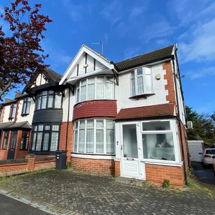 Rent this 4 bed townhouse on Dawlish Drive in Loxford, London