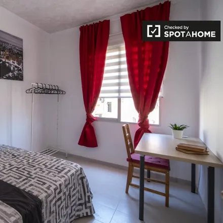 Rent this 3 bed room on Palacete de Ayora in Carrer dels Sants Just i Pastor, 46021 Valencia