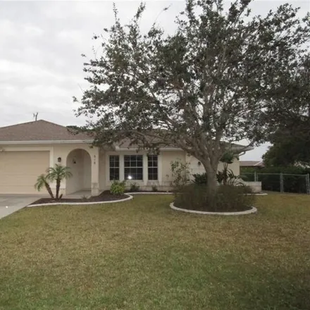 Rent this 3 bed house on 616 SE 17th Ter in Cape Coral, Florida