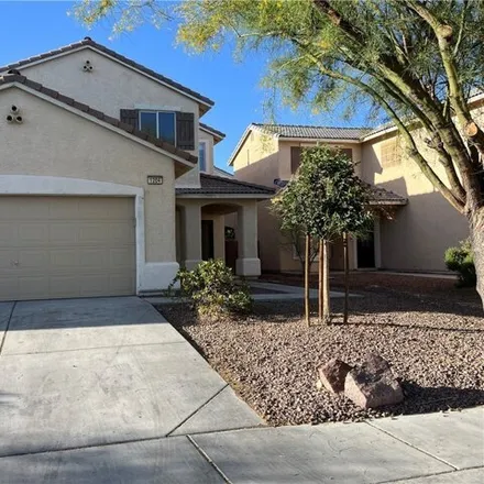 Rent this 4 bed house on 1256 Malibu Sands Avenue in North Las Vegas, NV 89086