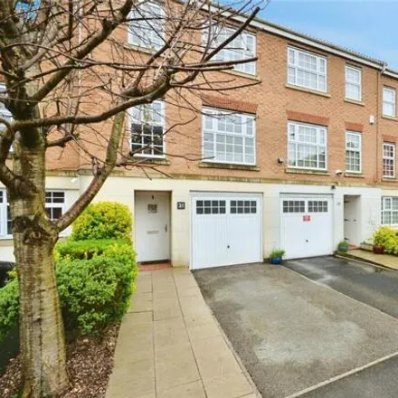 Buy this 3 bed townhouse on Edgecote Close in Wythenshawe, M22 4UT