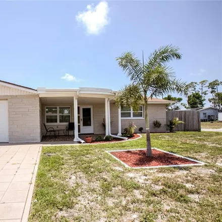 Buy this 2 bed house on 4939 Daphne Street in Elfers, FL 34652