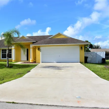 Buy this 3 bed house on 990 Southwest Versailles Avenue in Port Saint Lucie, FL 34953