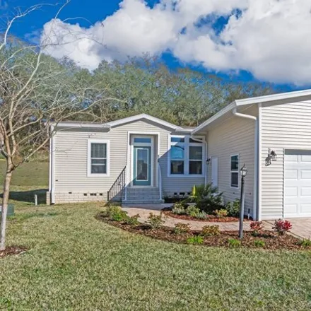 Buy this studio apartment on 650 Trevino Drive in Lady Lake, FL 32159