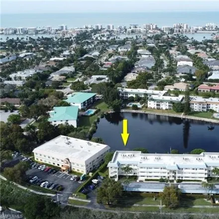 Buy this 2 bed condo on 3131 Riviera Drive in Naples, FL 34103