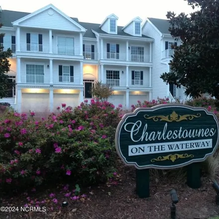 Buy this 4 bed house on 1906 Goose Creek Rd Sw Unit 2 in Ocean Isle Beach, North Carolina