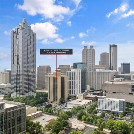 Rent this 1 bed condo on Peachtree Towers Condominiums in 300 Peachtree Street Northeast, Atlanta