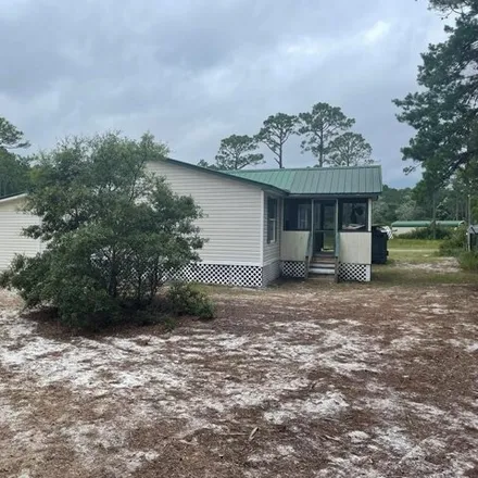 Buy this studio apartment on 376 Lily Circle in Franklin County, FL 32328