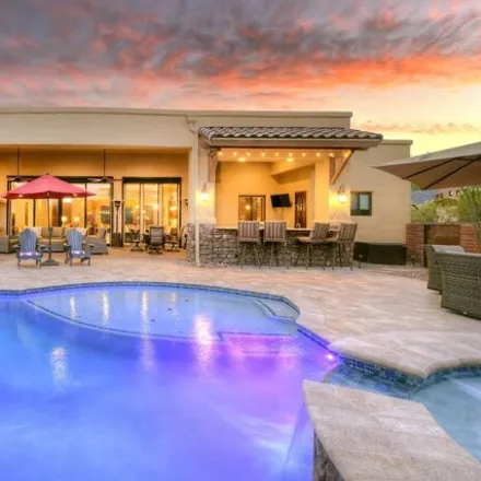 Buy this 4 bed house on North Sunset Gallery Drive in Marana, AZ