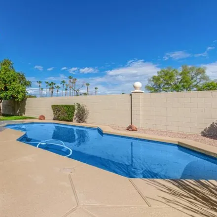 Buy this 4 bed house on 14423 North 91st Drive in Peoria, AZ 85381