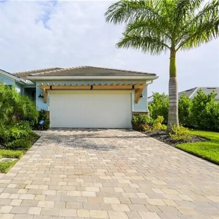 Rent this 4 bed house on Crescent Beach Way in Seasons, Bonita Springs