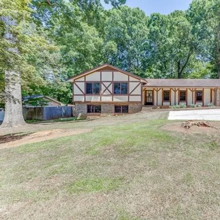 Buy this 4 bed house on 768 Rollingwood Dr in Stone Mountain, Georgia