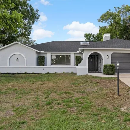 Buy this 3 bed house on 12415 Fish Cove Drive in Spring Hill, FL 34609