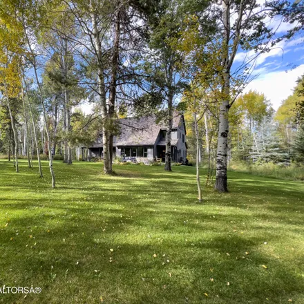 Buy this 3 bed house on 5443 Cottonwood Cnyn Road in Wilson, Teton County