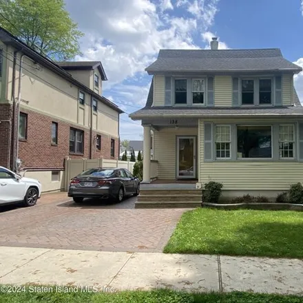Buy this 3 bed house on 138 Glenwood Avenue in New York, NY 10301