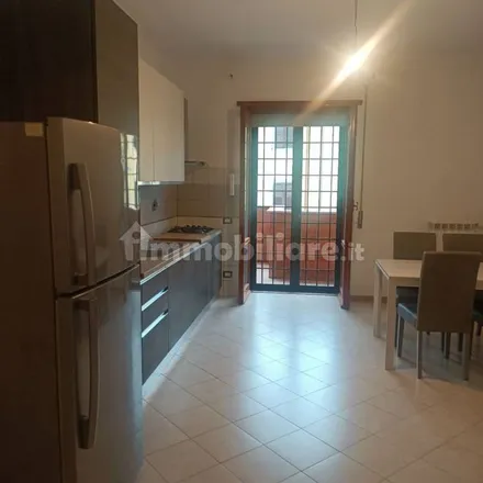 Rent this 3 bed apartment on Via Motta Visconti in 00168 Rome RM, Italy