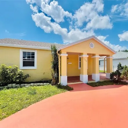 Buy this 3 bed house on 880 Northeast 1st Place in Hialeah, FL 33010