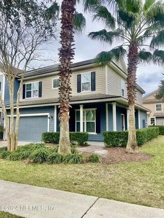 Rent this 4 bed townhouse on 281 Magnolia Creek Walk in Nocatee, FL 32081