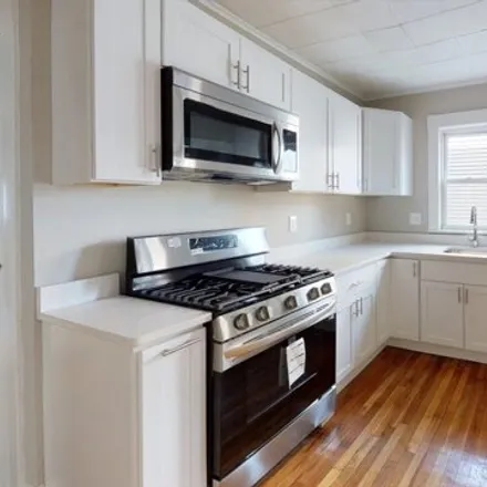 Rent this 4 bed apartment on 5 Edgar Ter Unit 2 in Somerville, Massachusetts