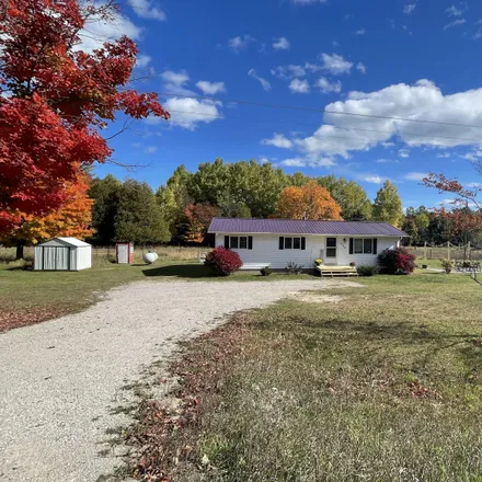 Buy this 3 bed house on 7150 Kate Hanson Road in Inverness Township, MI 49721