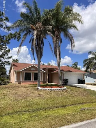 Rent this 3 bed house on 1354 Camas Avenue Northwest in Palm Bay, FL 32907