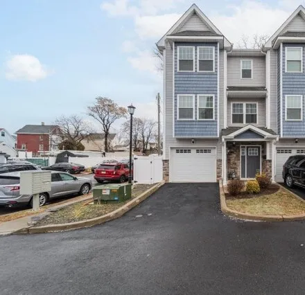 Rent this 3 bed townhouse on 326 McGuire Pl in Perth Amboy, New Jersey