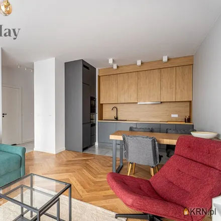 Buy this studio apartment on Warsaw in Skwer Janusza Grabiańskiego, 00-027 Warsaw