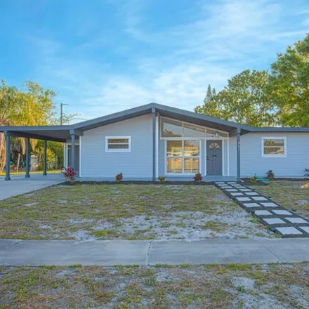 Buy this 3 bed house on 965 Canal Lane Northeast in Palm Bay, FL 32905
