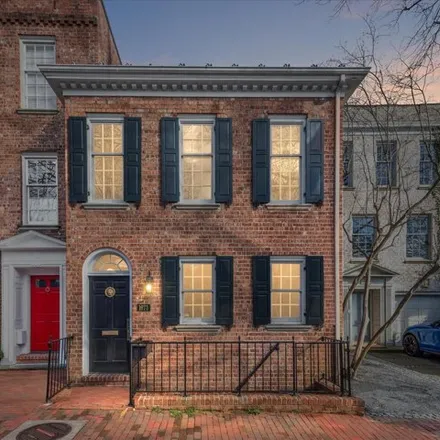Buy this 6 bed townhouse on 1673 34th Street Northwest in Washington, DC 20007
