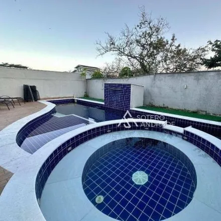 Rent this 4 bed house on Rua Marajó in Jardim Brasil, Caraguatatuba - SP