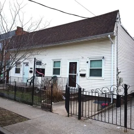Buy this 3 bed house on 1476 East 93rd Street in New York, NY 11236