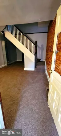 Buy this 5 bed townhouse on 1904 Mosher Street in Baltimore, MD 21217