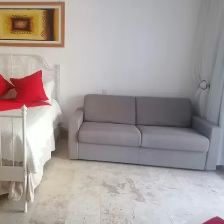 Rent this 2 bed room on Calle Miguel Ozuna in Boca Chica, Santo Domingo