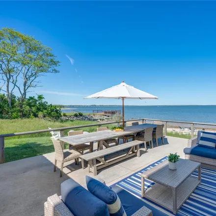 Rent this 4 bed house on 15 Lighthouse Road in Ponquogue, Hampton Bays