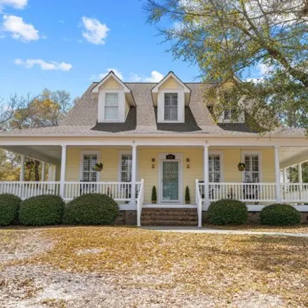 Buy this 5 bed house on 6217 Pebble Shore Lane in Southport, NC 28461