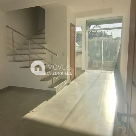 Buy this 2 bed house on Rua Coronel Frederico Carlos Gomes in Vila Nova, Porto Alegre - RS
