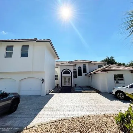 Rent this 3 bed house on 7872 Northwest 83rd Street in Tamarac, FL 33321