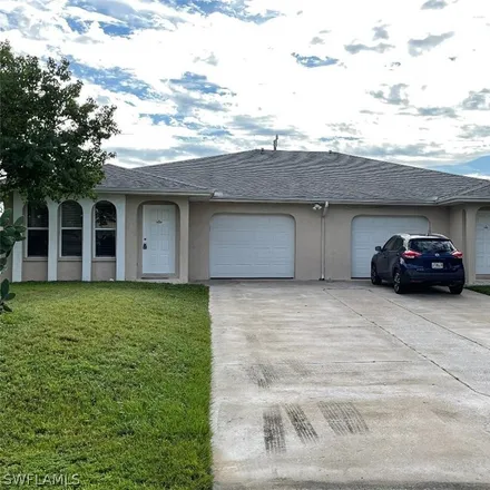 Rent this 3 bed duplex on 953 Southeast 8th Place in Cape Coral, FL 33990