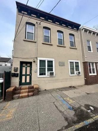 Buy this 8 bed house on 114 East 22nd Street in Port Johnson, Bayonne