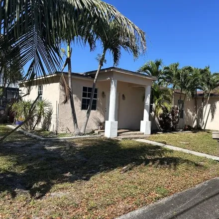 Buy this 3 bed house on 1011 Hampton Road in West Palm Beach, FL 33405