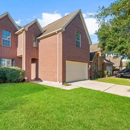 Rent this 4 bed house on 13755 Westminster Glen Lane in Harris County, TX 77049