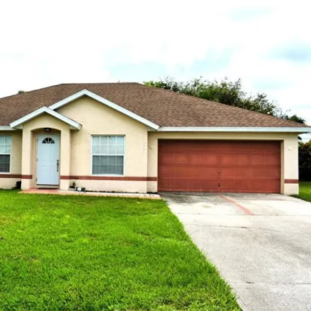 Buy this 4 bed house on 2548 Southwest Abate Street in Port Saint Lucie, FL 34953