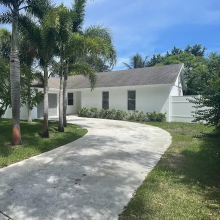 Rent this 4 bed house on 310 Elaine Circle West in West Palm Beach, FL 33409